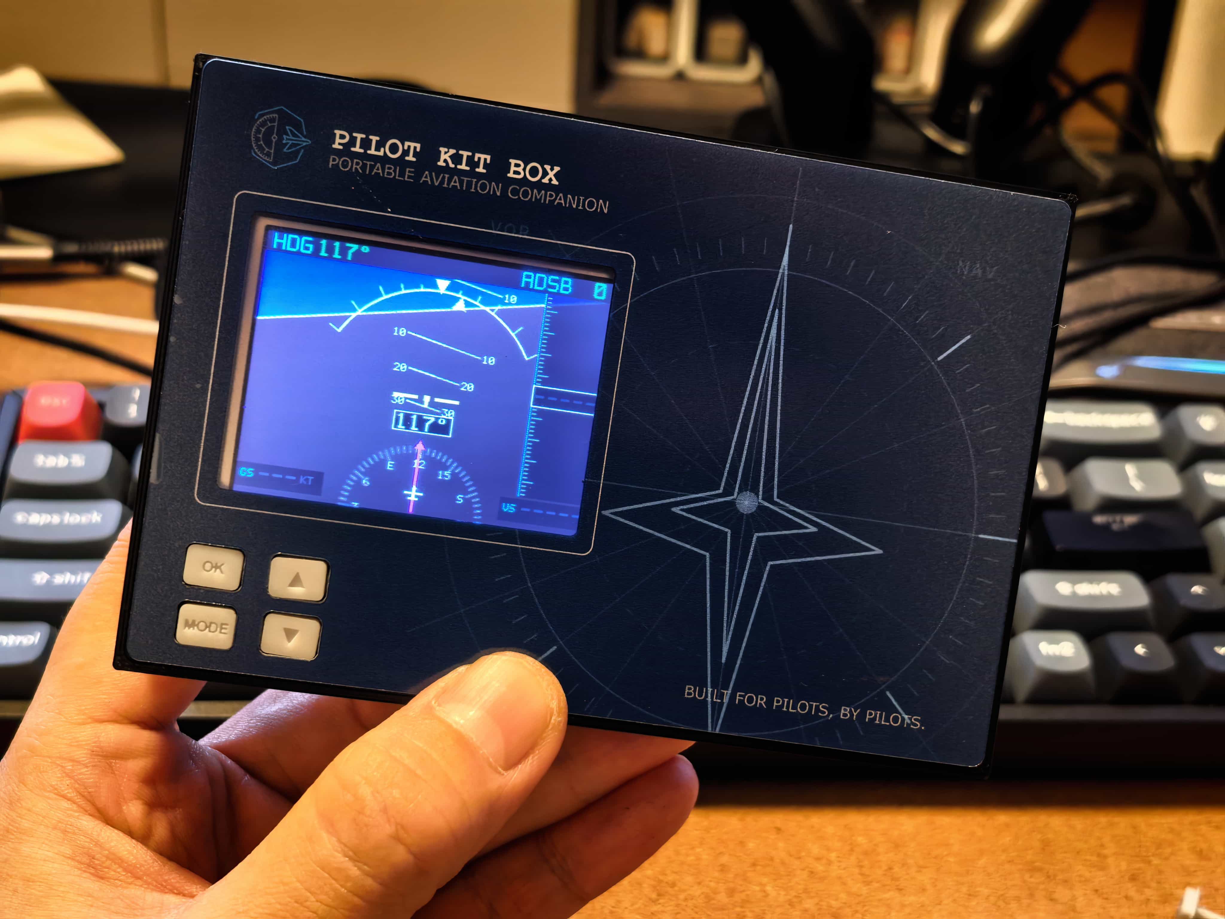 Finished Pilot Kit Box prototype with carrier board, display, and 3D-printed faceplate